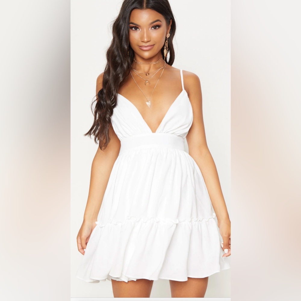 Pretty little thing white ruched frill detail strap skater dress. NWT size 8